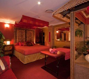 Elegant red and gold Asian Room in a brothel in Brisbane