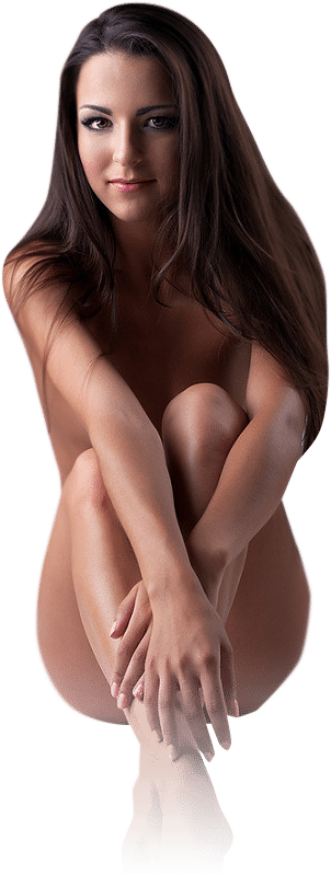 naked brunette lady sitting with legs and arms crossed